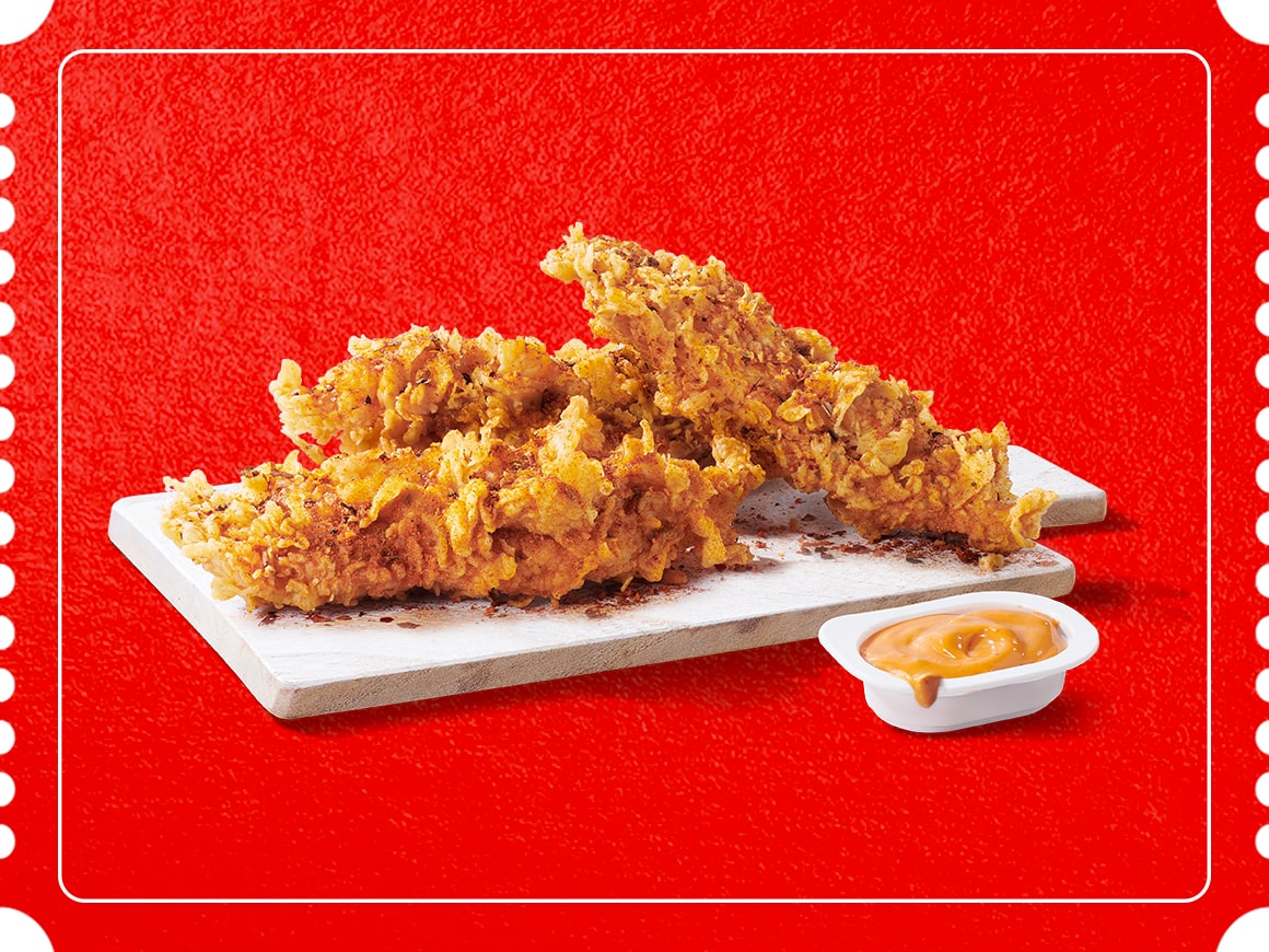 A close-up of KFC Free Strips offer banner showing crispy fried chicken strips on a red background